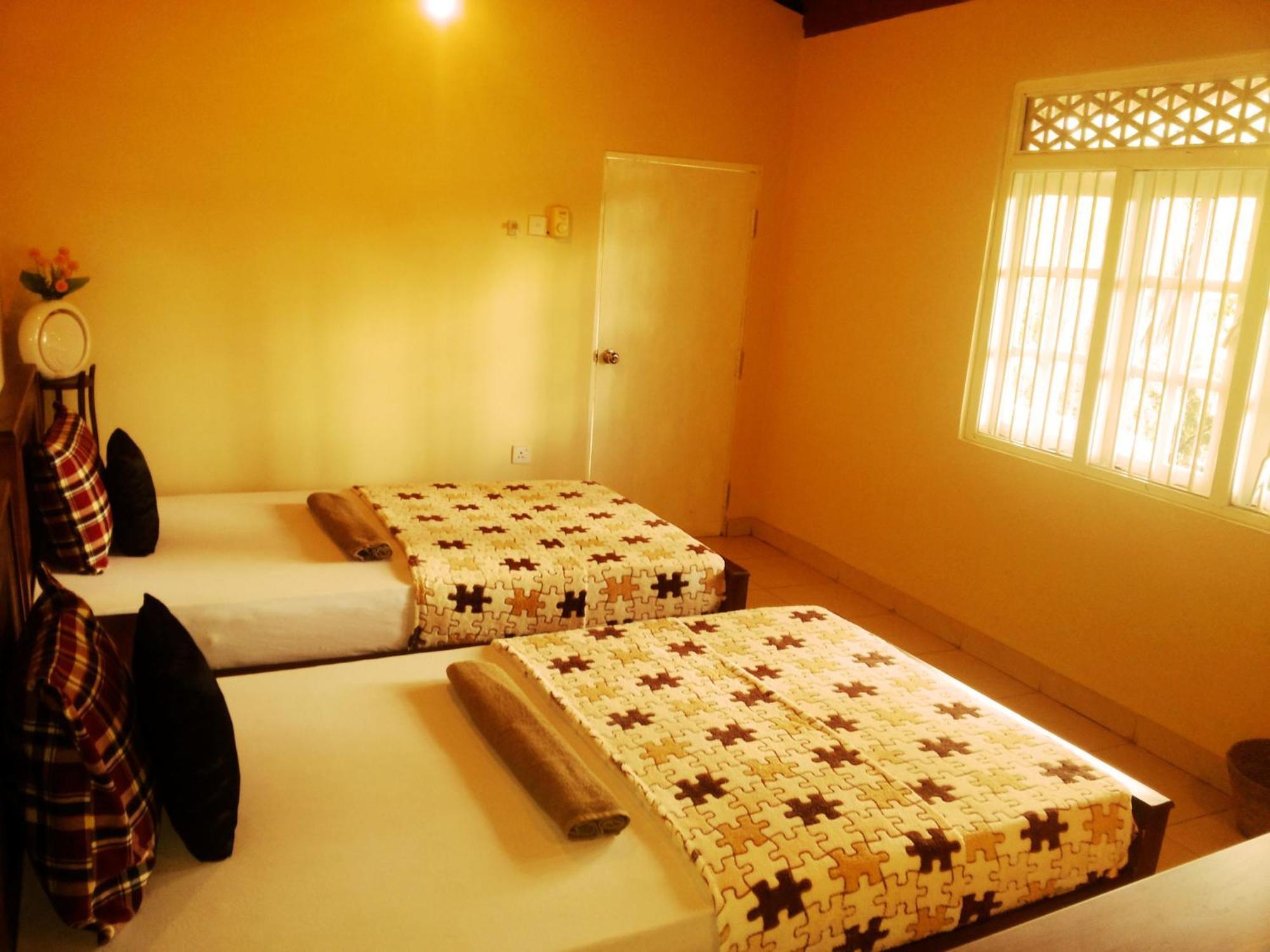 Hotel Tinaya Dambulla Quarto foto