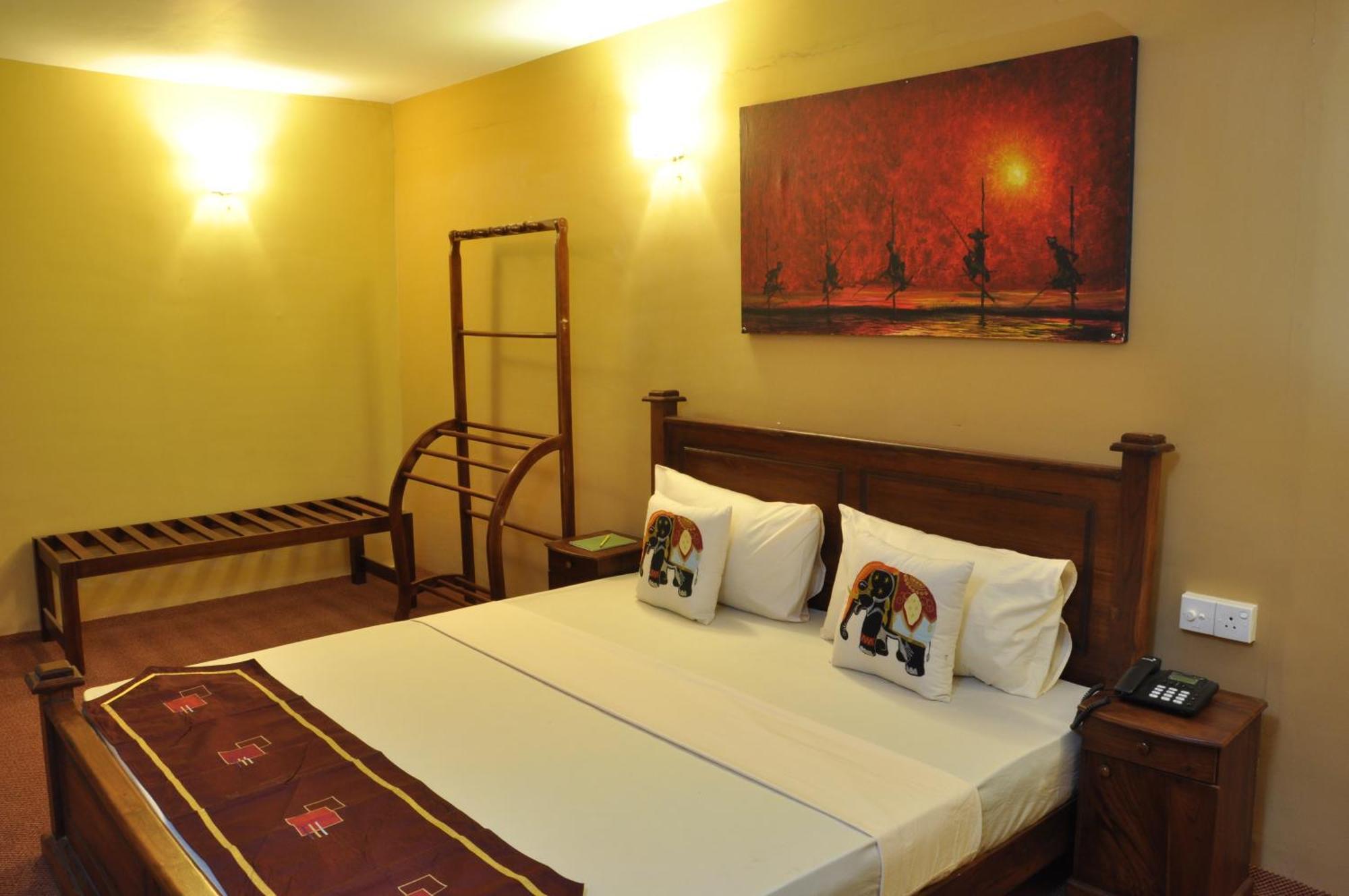 Hotel Tinaya Dambulla Quarto foto
