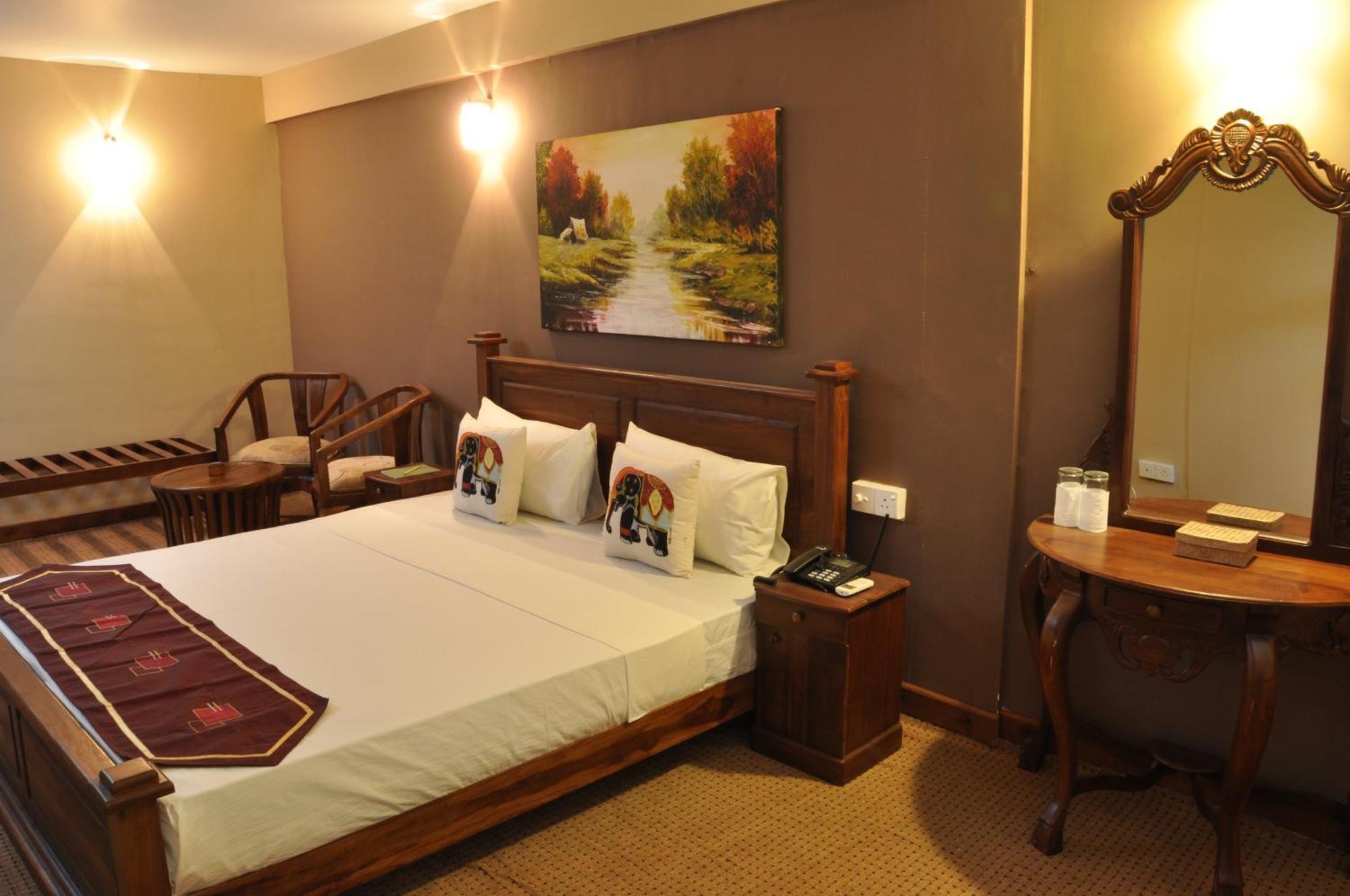 Hotel Tinaya Dambulla Quarto foto